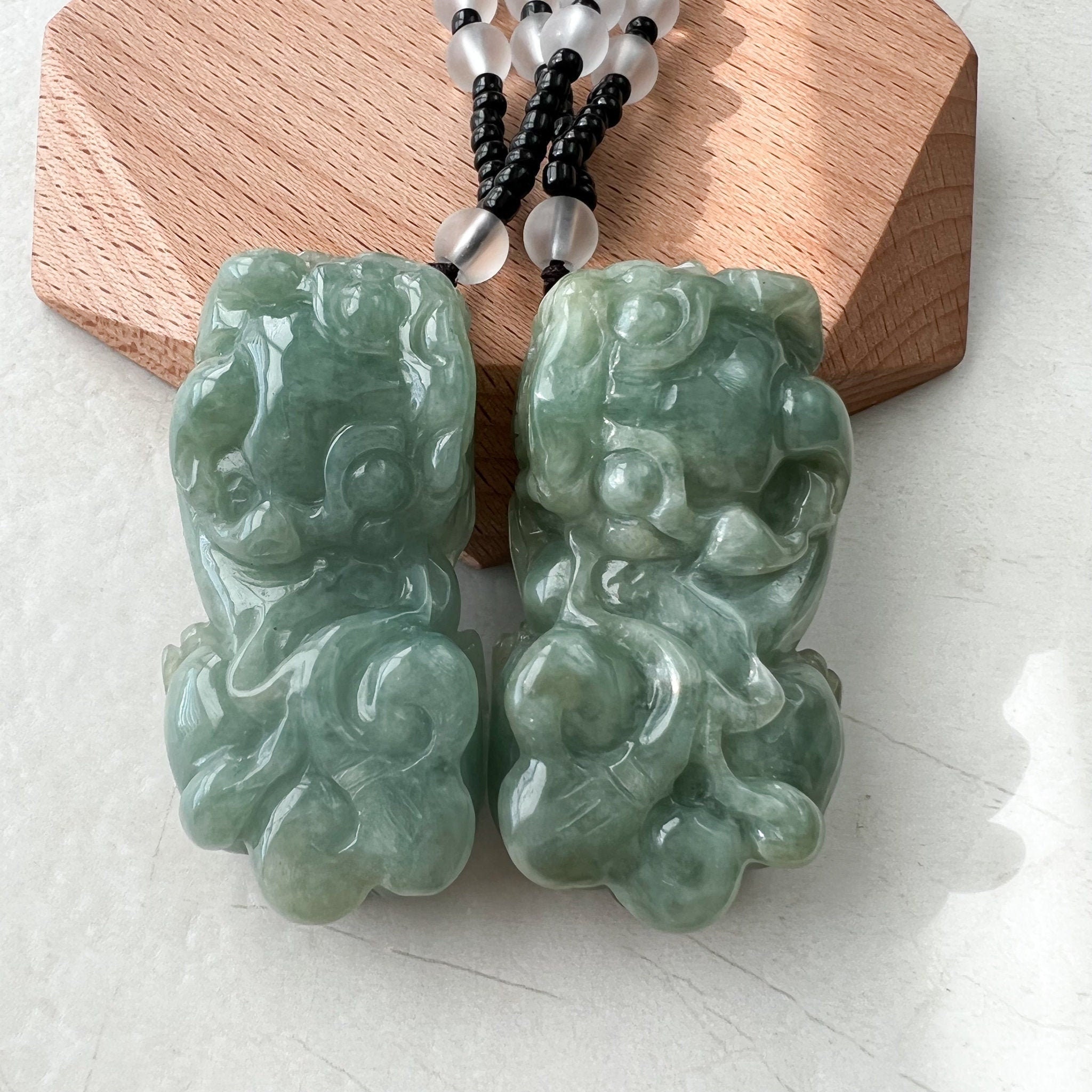 Jade lion best sale pendant