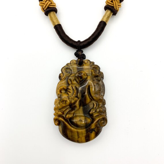 Carved Tigers Eye Bull Pendants Carved Tigers Eye Bull Pendants