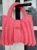 Crocheted handbag product logo