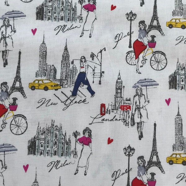 Fashion Girls Travel on White New York Milan Paris Londres Fille 100 % coton Tissu FQ Fat Quarter 1/4, 1/2 ou par mètre (choisissez une taille)