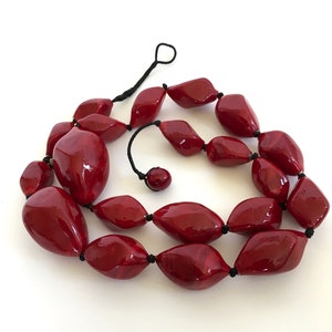 Red Murano BLOWN GLASS NECKLACE of 20 glass beads 2 to 5 inches long on 40 inch cotton cord by Salviati Venezia 1859, Italy. Statement piece