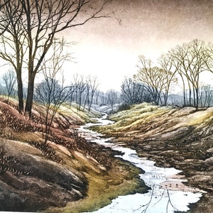 May include: A serene landscape painting depicts a stream winding through a valley. Bare trees line the banks, with muted tones of brown, green, and gray creating a tranquil, natural scene. The artwork evokes a sense of calm.