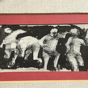 May include: A framed black and white print depicting a group of figures in motion. The artwork, set against a red mat, features a dynamic, sketch-like style with visible brushstrokes. The frame is a light brown color.