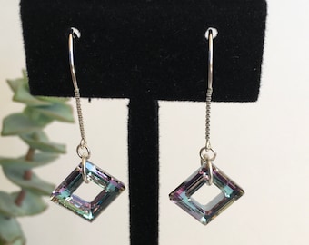 Sparkle with these Swarovski crystal earrings on sterling hooks with box chain.