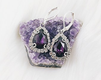 Dark purple teardrop rhinestone gem earrings.