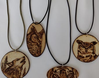 Handmade wood burning necklaces