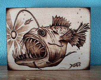 Hand burned deep sea Anglerfish wood burning on basswood, pyrography