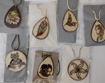 Handmade wood burning necklaces