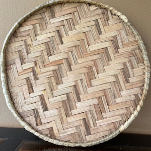 Handmade Woven round tray for covering  extra large calabash bowls and as Decorative Art pieces , from the west Coast of Africa.