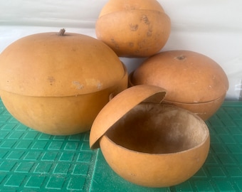 Natural Hand-made calabash bowls/pans with covers from west Africa.