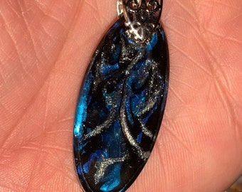 Hand poured resin pendant