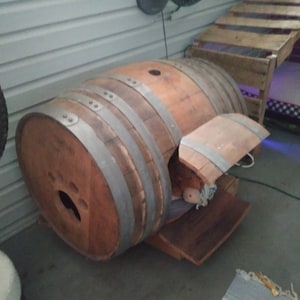 Recycled wood wine barrel into dogs home