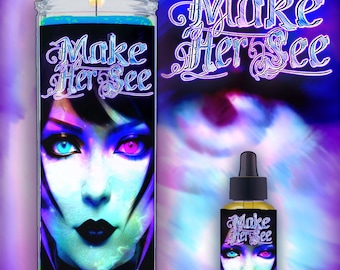 May include: A blue and purple candle with a woman's face on the front. The candle is lit and the text "Make Her See" is printed on the front.