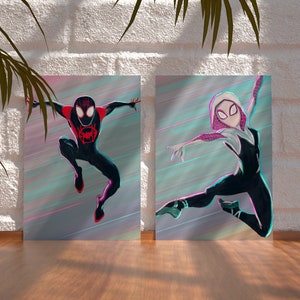 May include: Two digital art prints featuring Spider-Man characters. The print on the left shows Miles Morales, Spider-Man, in a black and red suit with a red spider symbol on his chest. The print on the right shows Gwen Stacy, Spider-Gwen, in a white and black suit with a white spider symbol on her chest. Both characters are in mid-air, with a colorful, abstract background.
