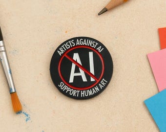 Artists against ai enamel pin: support human art badge