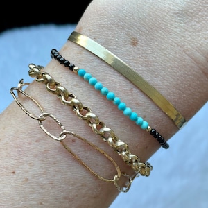 ¡Pulsera de ónix, oro y turquesas!