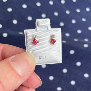 10k solid yellow gold, natural diamond and natural ruby stud earrings!