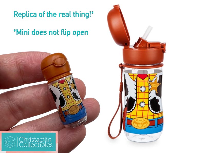 May include: A clear plastic water bottle and a miniature replica, both featuring a Woody-themed design. The bottle has a brown lid and a straw. The miniature is held in a hand. The text "Replica of the real thing!" is visible.