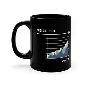 May include: Black ceramic coffee mug with a white line graph and the text "SEIZE THE DATA" on it.