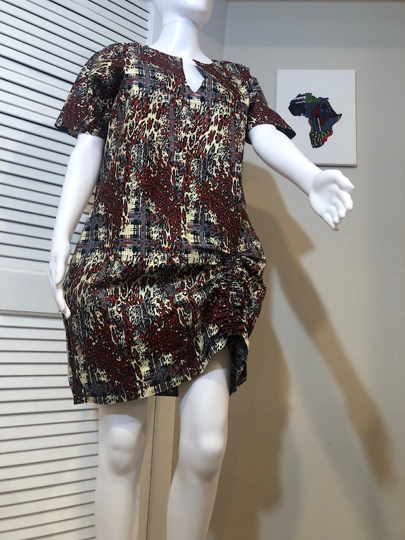 Pull string dress.