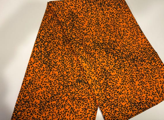 Bold Orange and Black African print fabric