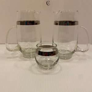 13. 2 Libbey Silver Overlay Band Martini Cocktail Pitcher with One Matching Glasses