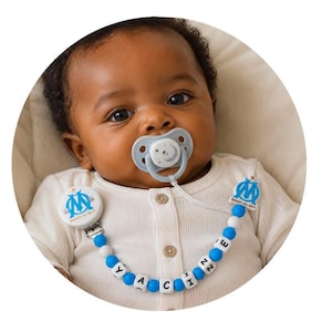 OM Marseille Football pacifier clip - a great gift idea for a newborn at a low price.