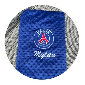 Beautiful Paris Saint-Germain (PSG) plaid blanket, perfect baby shower gift in blue, pink, and white.