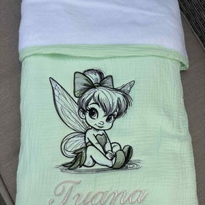 Personalized embroidered Tinker Bell minky gauze cotton throw, customizable baby gift in pink, white, blue, red, and aqua.