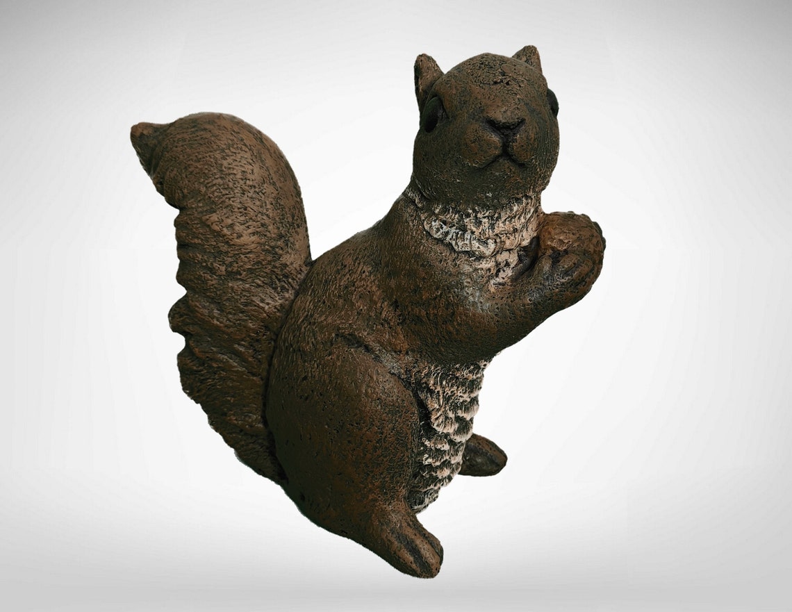cement squirrel statue