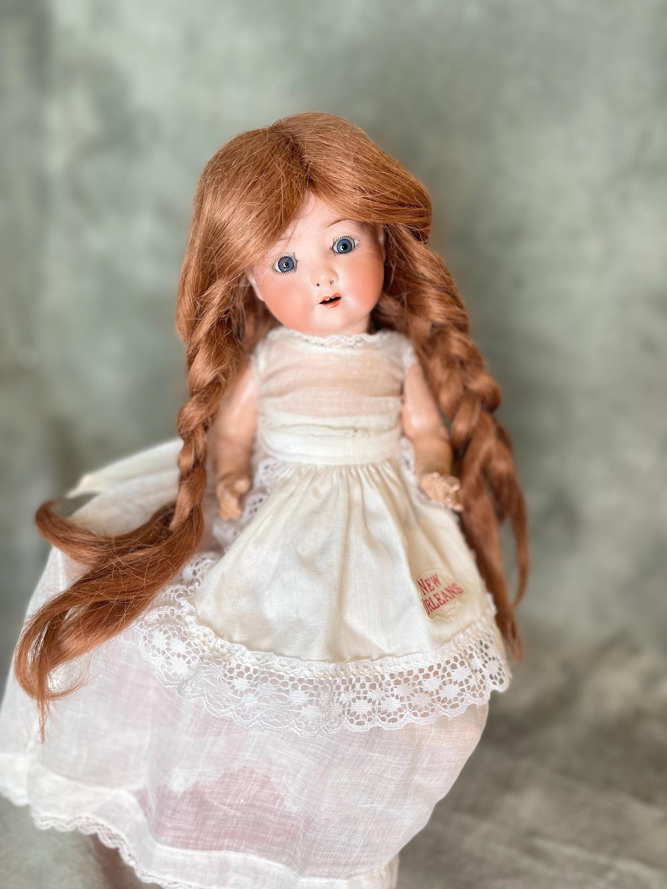A heubach koppelsdorf black baby doll | Hartleys Auctioneers & Valuers