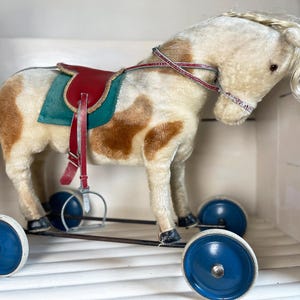 Vintage Steiff Mohair Ride-On Horse: 1950s German Toy with Saddle