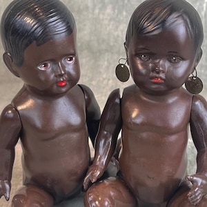 TWO antique  celluloid dolls , RARE 1930 Cellba Celluloid Schoberl & Becker African Baby Doll