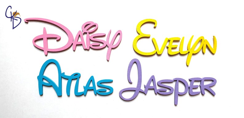 May include: Four wooden names, "Daisy", "Evelyn", "Atlas", and "Jasper", are cut in a Disney-style font. The names are painted in pink, yellow, blue, and purple.