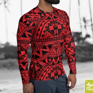 May include: A red and black long-sleeved shirt with a geometric pattern. The pattern is reminiscent of Polynesian tribal art.
