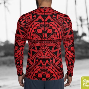 May include: A red and black long-sleeved shirt with a geometric pattern. The pattern is reminiscent of Polynesian tribal art.
