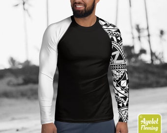 May include: Black and white long-sleeve shirt with a geometric pattern on the right sleeve. The shirt has a white raglan sleeve and a black body.