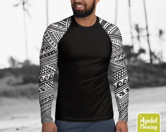 May include: Black long-sleeve shirt with a white Polynesian-style pattern on the sleeves. The shirt is made of a stretchy, athletic material.