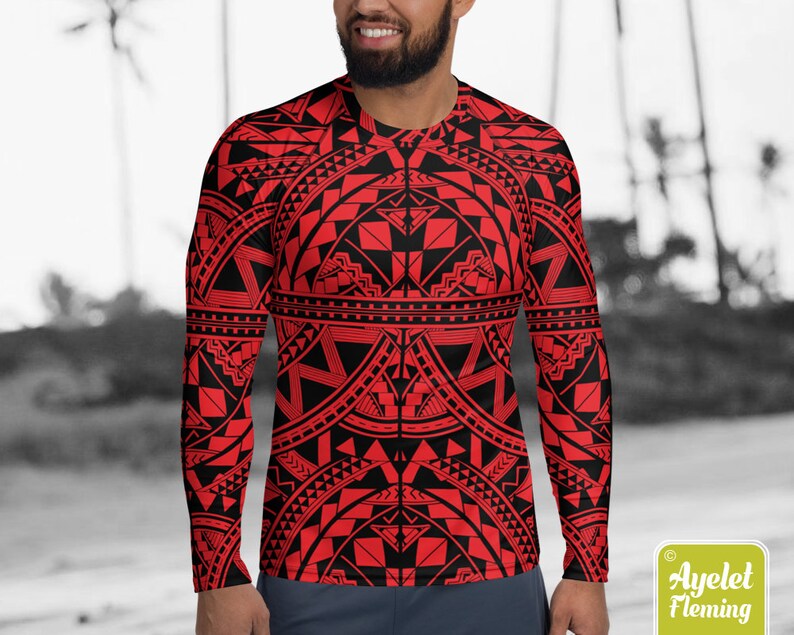 May include: Red and black long-sleeved shirt with a geometric pattern. The pattern is reminiscent of Polynesian tribal art.
