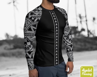 May include: Black long-sleeve shirt with a geometric pattern in gray on the sleeves and a vertical gray pattern down the front.