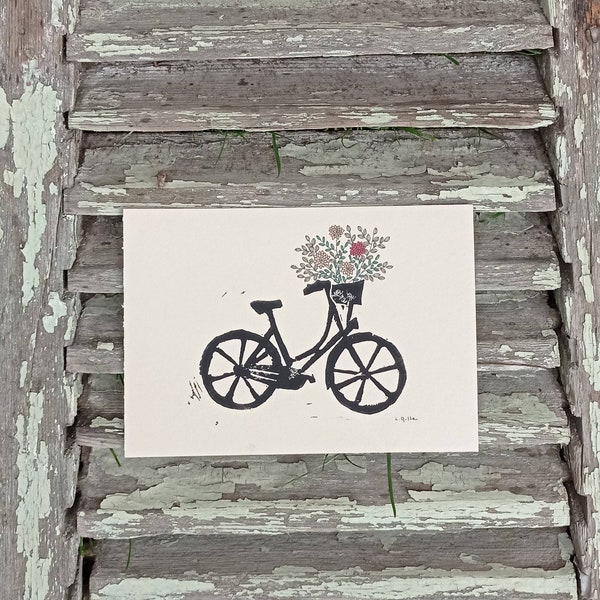 Linogravure et dessin Paulette à bicyclette