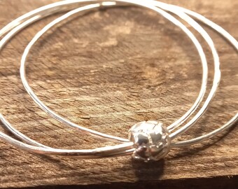 Triple silver bangles with heart stamped keeper bead, silver stacking bangles, handmade silver bangle, postal gifts, made in the UK