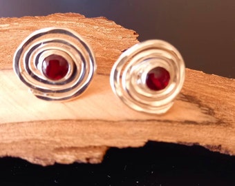 Silver studs with red garnet stones, silver swirl earrings, recycled silver, handmade silver earrings, postal gifts, handmade in UK