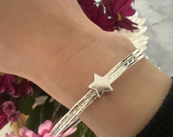 Sterling silver bangle trio with star keeper bead, hammered silver bangles, stacking bangles, handmade in the UK, postal gifts