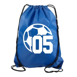 May include: Blue drawstring bag with a white soccer ball and the number 05 printed on it.