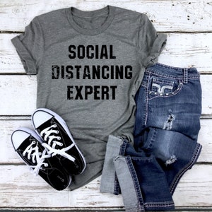 Social Distancing Expert T-Shirt, Quarantine 2020, Social Distancing Champ, Like A Good Neighbor Stay Over There, Funny Qute Tee
