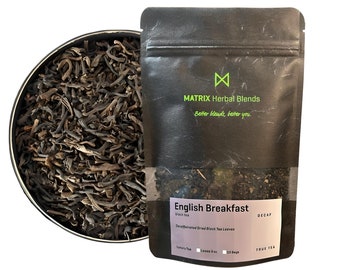 May include: A black pouch with a white label that reads "MATRIX Herbal Blends" and "Better blends, better you." The pouch contains loose leaf English Breakfast black tea. The label also says "Decaffeinated Dried Black Tea Leaves" and "TRUE TEA".