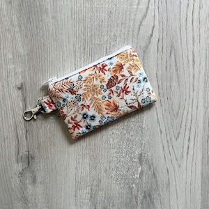 Mini llavero con cremallera y hojas marrones otoñales, cartera pequeña con flores azules, monedero otoñal, bolsa con clip giratorio, tarjetero pequeño