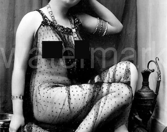Woman lying naked, vintage photo print, 20th century