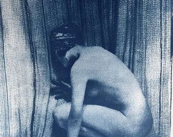 Portrait of a young girl behind a curtain. Cyanotype - original large format print on 300gsm thick paper.